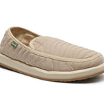 Beige quilted slip-on shoe on a white background