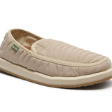 Beige quilted slip-on shoe on a white background