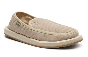 Beige quilted slip-on shoe on a white background