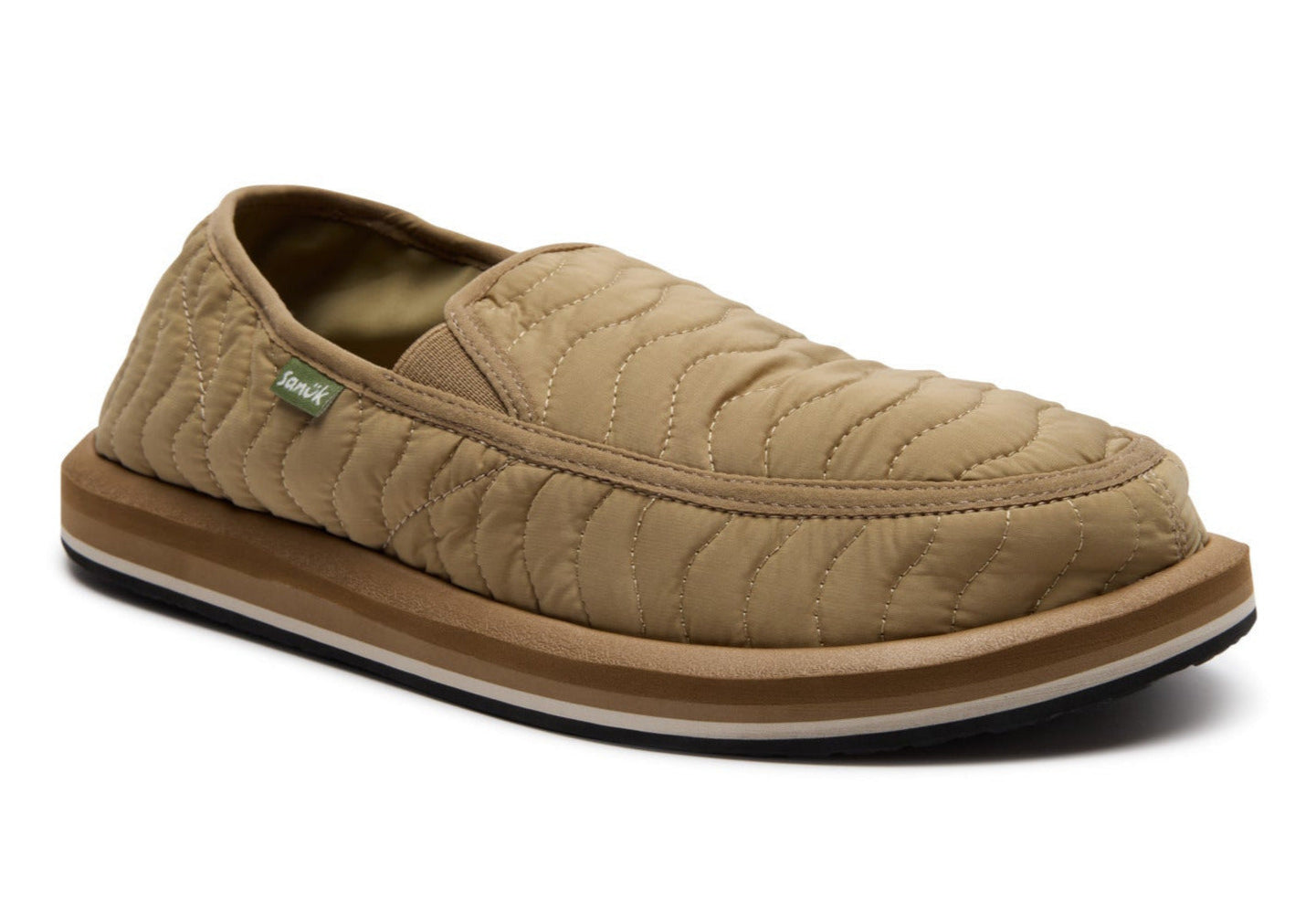 Beige quilted slip-on shoe on a white background