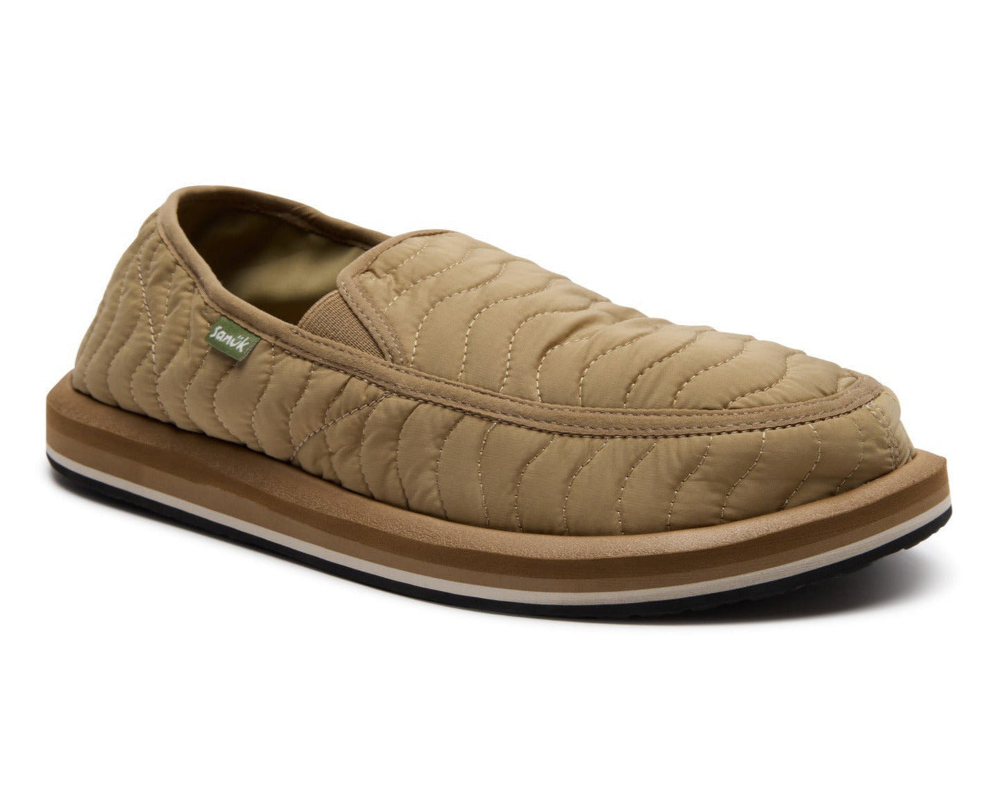 Beige quilted slip-on shoe on a white background
