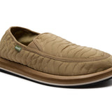 Beige quilted slip-on shoe on a white background