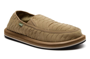Beige quilted slip-on shoe on a white background